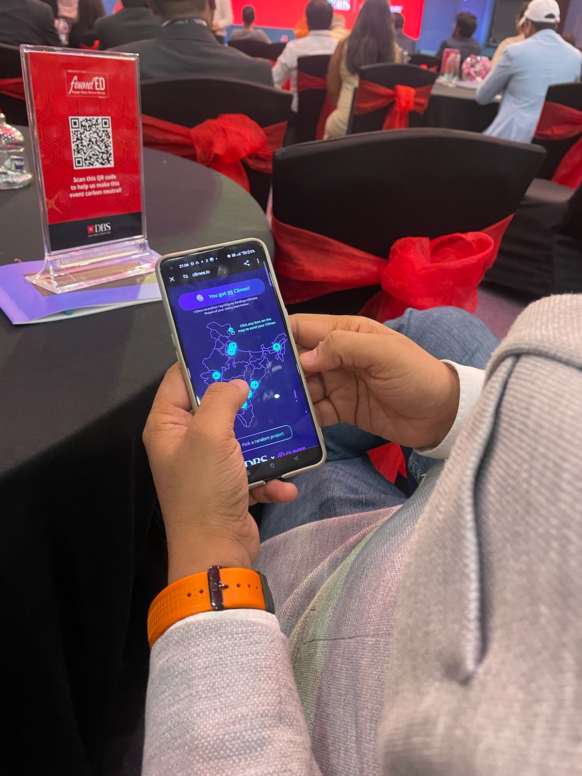 Attendee voting on climate project at DBS event
